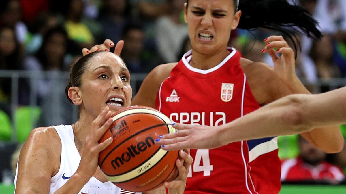 U.S. forward Diana Taurasi pulls up in Wednesday's group game against Serbia.