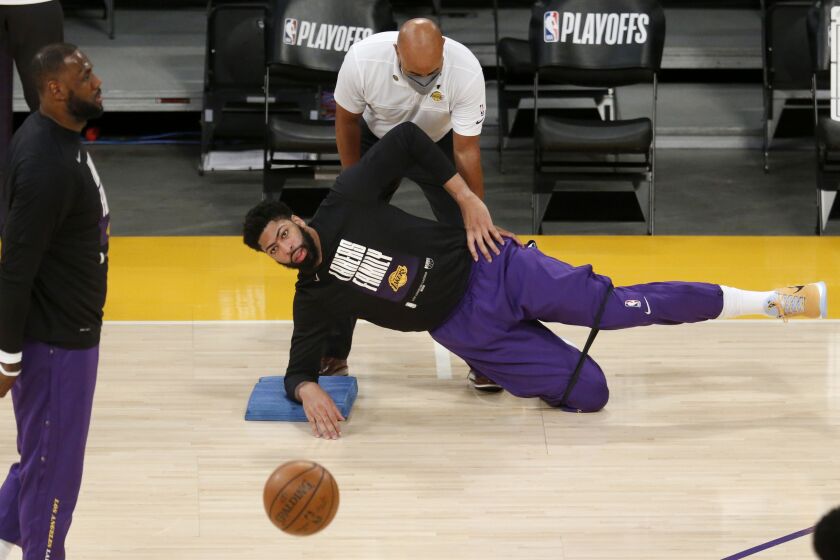 LOS ANGELES, CA - MAY 30: Los Angeles Lakers forward Anthony Davis (3) gets stretched out.