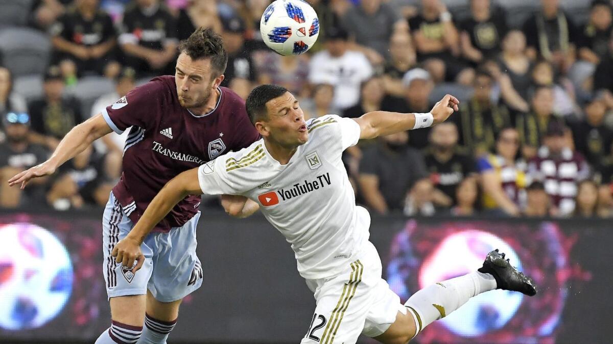 Colorado Rapids defender Danny Wilson, left, and Los Angeles FC forward Christian Ramirez vie for the ball during a match in August.