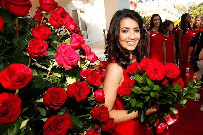Rose Queen Vanessa Natalie Manjarrez poses for photographers after the Pasadena Tournament of Roses named her as the 95th rose queen on Tuesday morning.