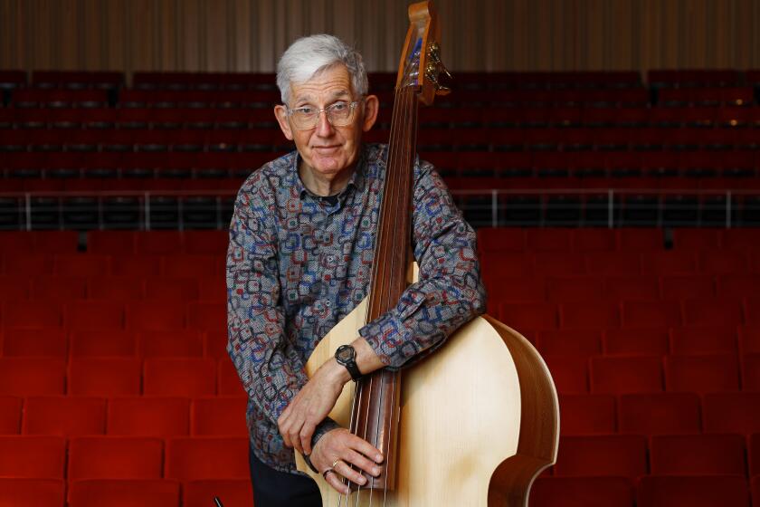 San Diego, CA - April 25: Mark Dresser, a music professor at UC San Diego and is about to release his latest album, "Time of Change," shown here at the Conrad Prebys Concert Hall on Tuesday, April 25, 2023 in San Diego, CA. (K.C. Alfred / The San Diego Union-Tribune)