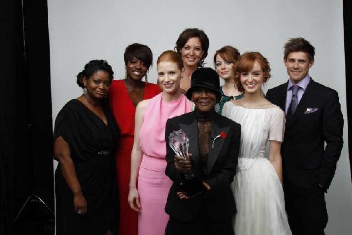 "The Help" ensemble celebrates at this year's Critics Choice Awards. Next year's date, which coincides with Oscar nominations, will mean a long day for some in Hollywood.