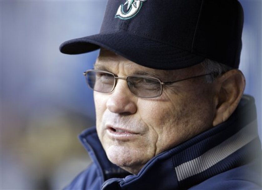 Seattle Mariners manager John McLaren looks out from the dugout before the baseball game against the Florida Marlins Wednesday, June 18, 2008, in Seattle. McLaren was fired Thursday, June 19, 2008, as the team lags with the worst record in baseball. Bench coach Jim Riggleman will run the team for the rest of the Mariners lost season beginning Friday night in Atlanta.(AP Photo/Elaine Thompson)