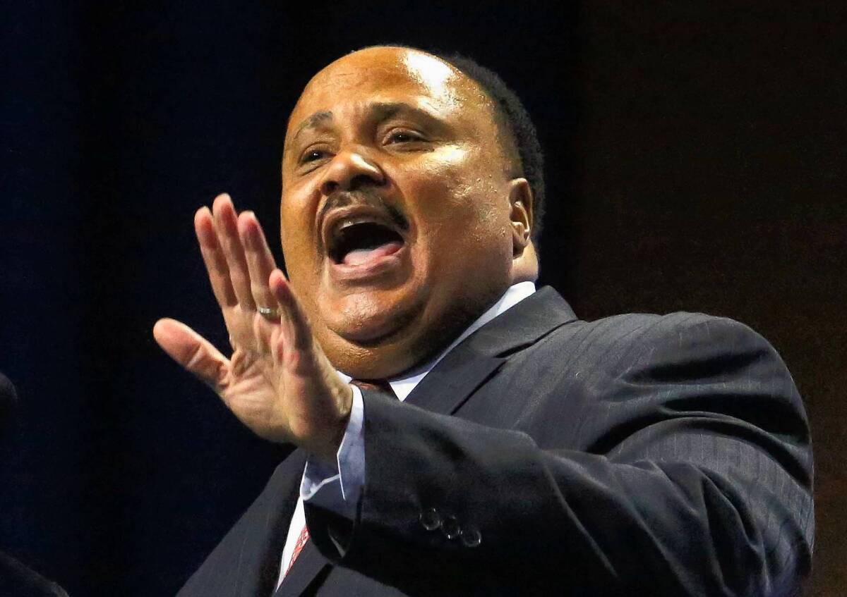 Martin Luther King III tells an NAACP convention crowd Wednesday that “the dream of my father has not been fulfilled.” He called the George Zimmerman verdict “a wake-up call.”