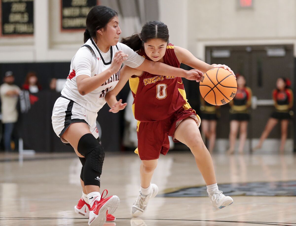 Ocean View's Laney Bae (0) will drive around Segerstrom's Valeria Quero during Wednesday's Golden West League match.