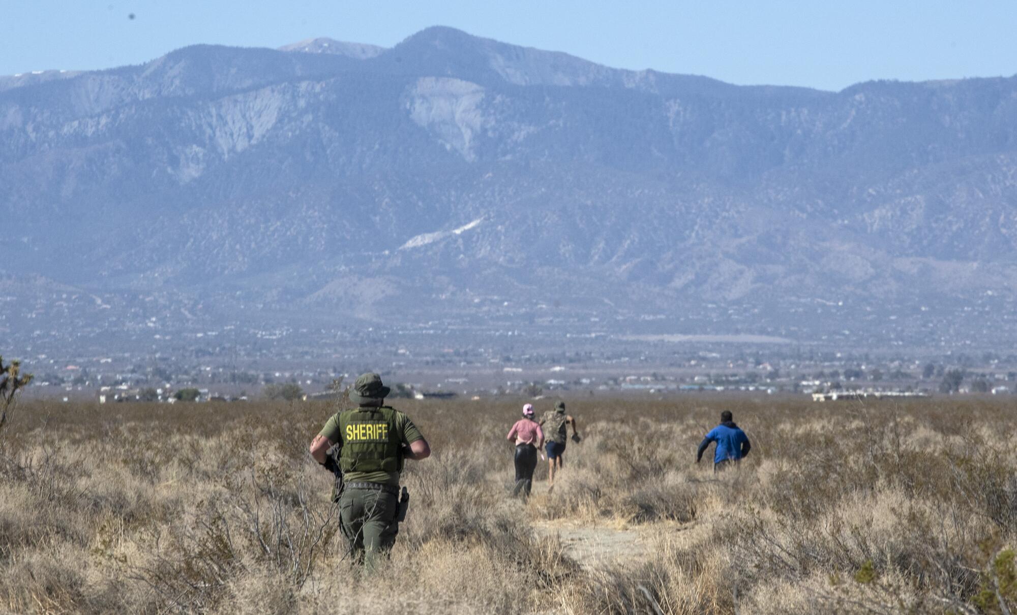 A San Bernardino County Sheriff's deputies chase workers at an illegal cannabis grow.