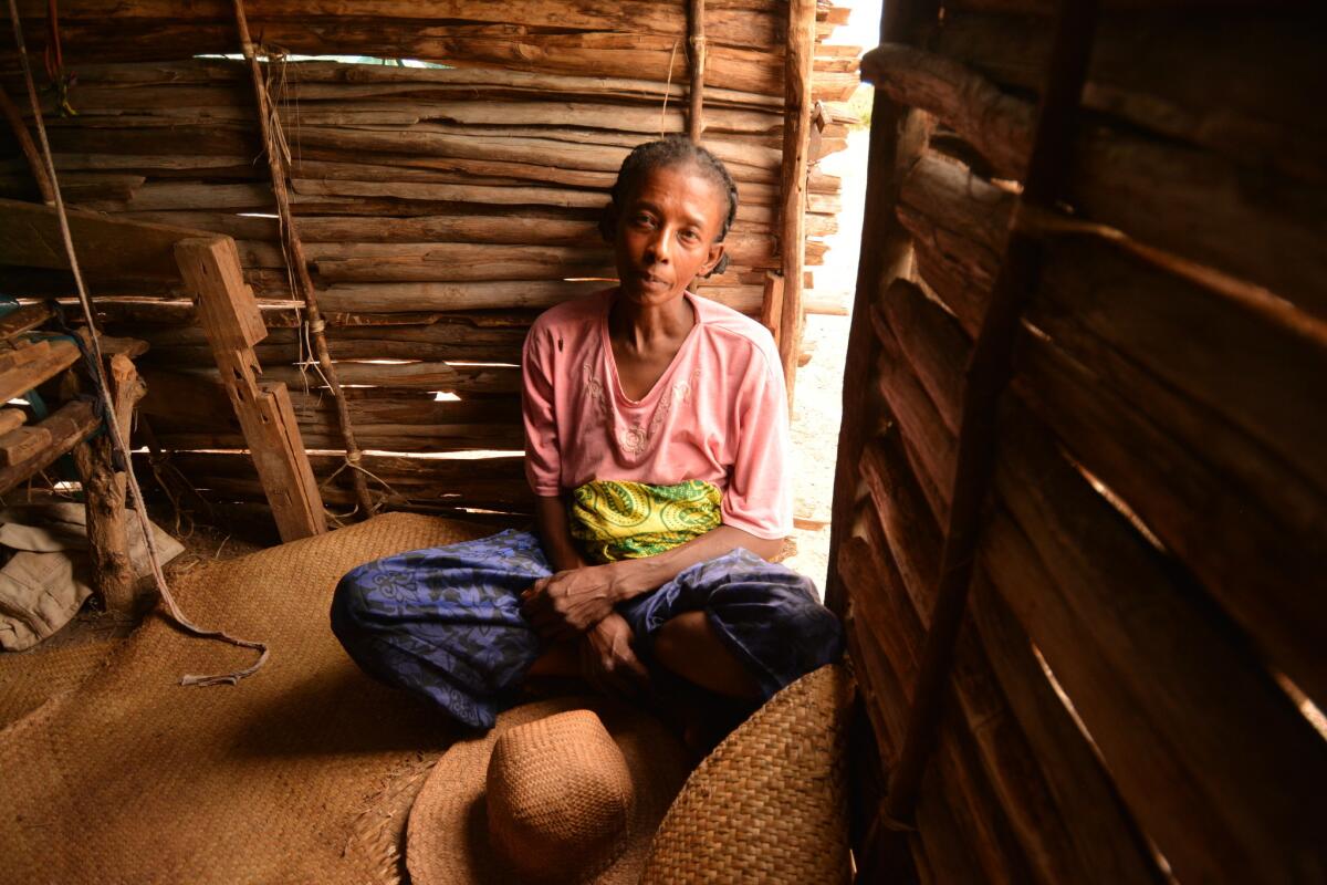 Her small stick house is bare. Tonelie, of Kobokara village in southern Madagascar, had to sell everything to buy water and food.