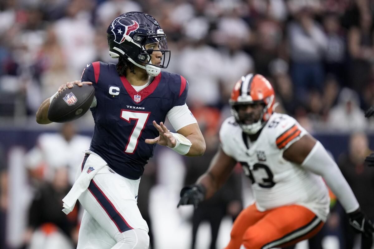 Houston Texans quarterback C.J. Stroud passes against the Cleveland Browns in their playoff game.