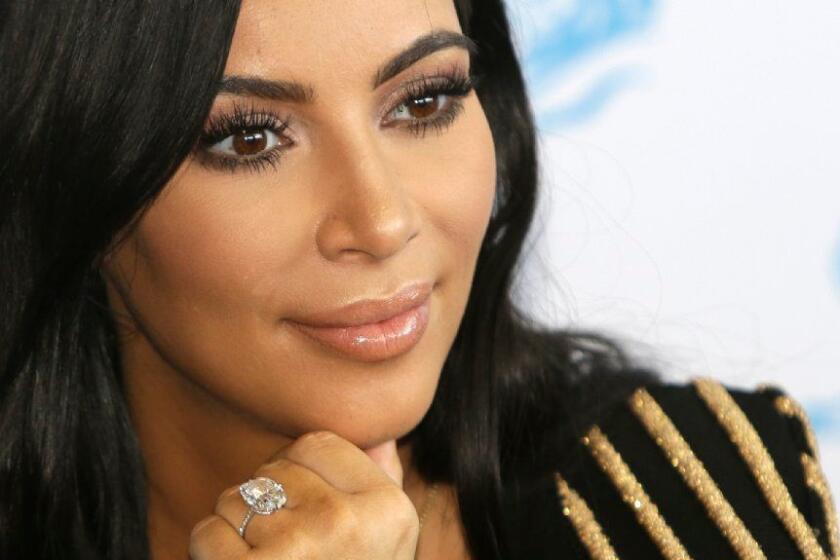 FILE - In this June 24, 2015 file photo, American TV personality Kim Kardashian attends the Cannes Lions 2015, International Advertising Festival in Cannes, southern France. Kardashian West was held at gunpoint during a 2016 jewelry heist, and it is revealed Thursday Sept. 28, 2017, that Aomar Ait Khedache the alleged mastermind behind the Paris robbery of Kim Kardashian West has written a letter of apology to the reality TV star, from his prison cell. (AP Photo/Lionel Cironneau, FILE)
