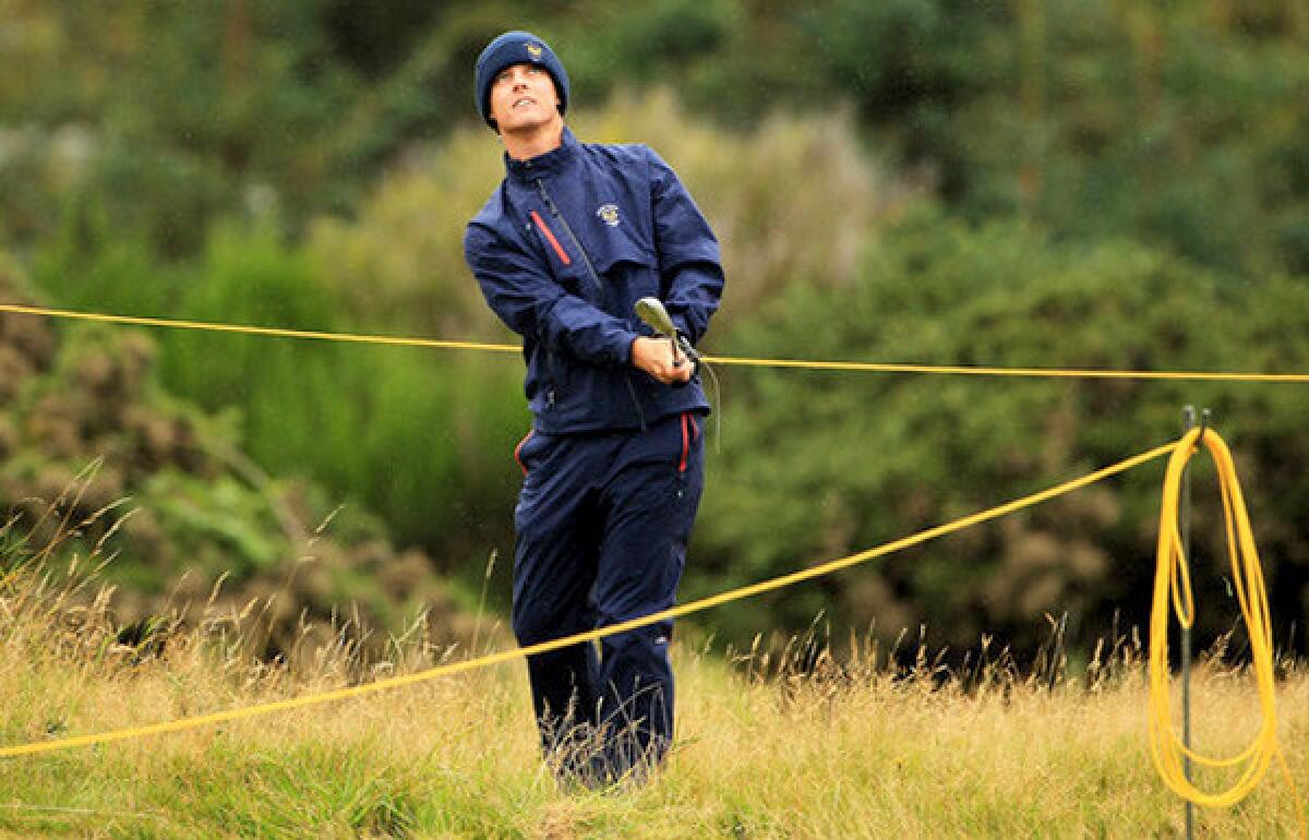 Blayne Barber hits a shot from the rough at No. 15 during a practice round before the 2011 Walker Cup at the Balgownie Links at Royal Aberdeen Golf Club in Scotland.