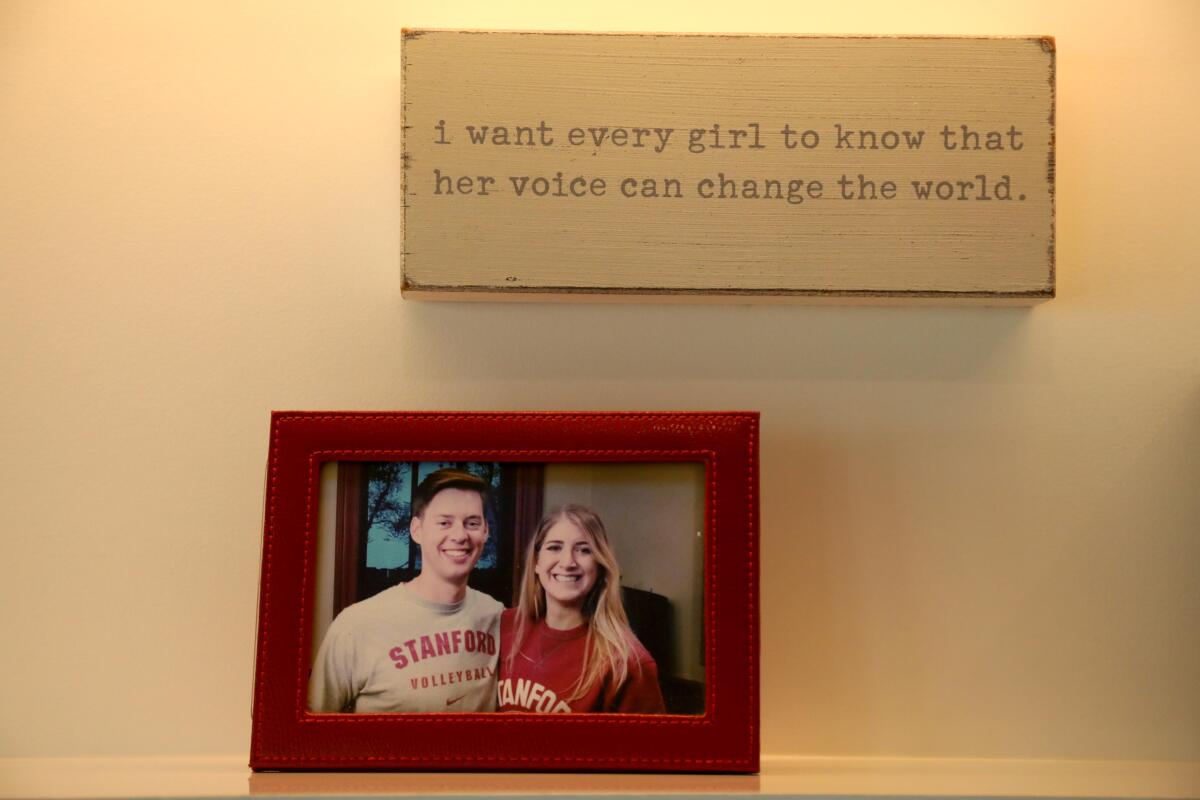 A photo of a man and woman, with a quote above it saying: "I want every girl to know that her voice can change the world."