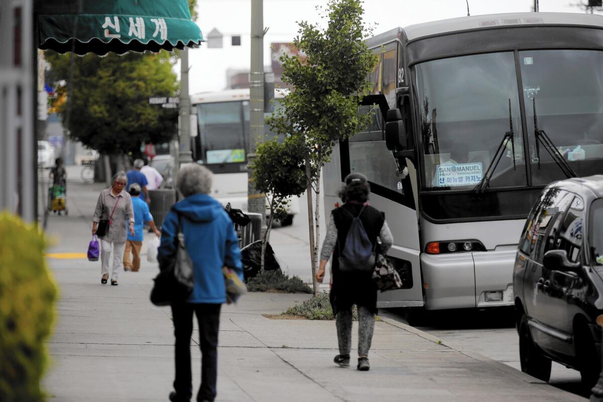 The buses depart Koreatown daily, leaving as early as 6:30 a.m. A few years ago, one casino honored the owner of a Koreatown-based tour company for delivering her 1 millionth customer to the gambling hall.
