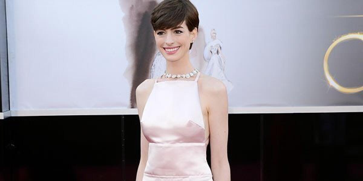 Actress Anne Hathaway arrives at the Oscars.