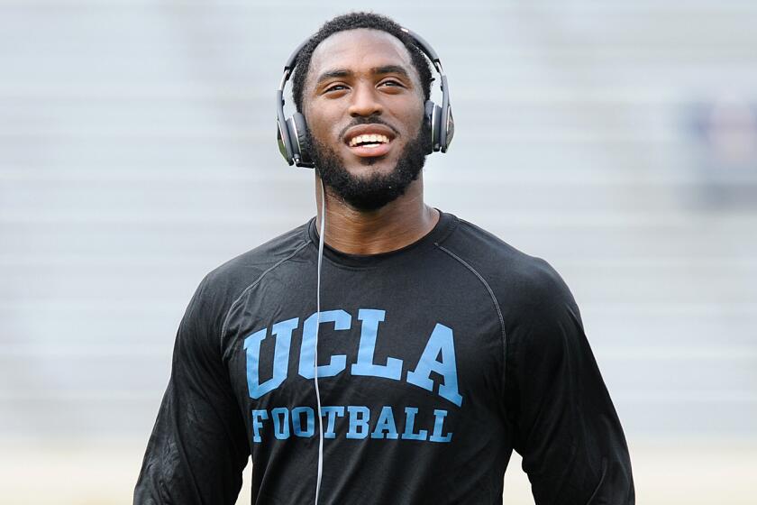 UCLA linebacker Deon Hollins warms up on Aug. 30 before the team's 2014 season opener against Virginia.