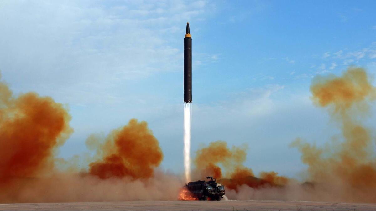 This undated file photo distributed by the North Korean government shows what was said to be the test launch of an intermediate-range Hwasong-12 in North Korea.