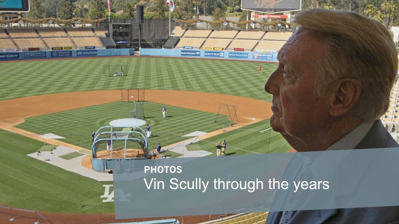 Dodgers broadcaster Vin Scully looks over Dodger Stadium before a game on July 3, 2012. Scully has worked as an announcer for the Dodgers organization for more than six decades.