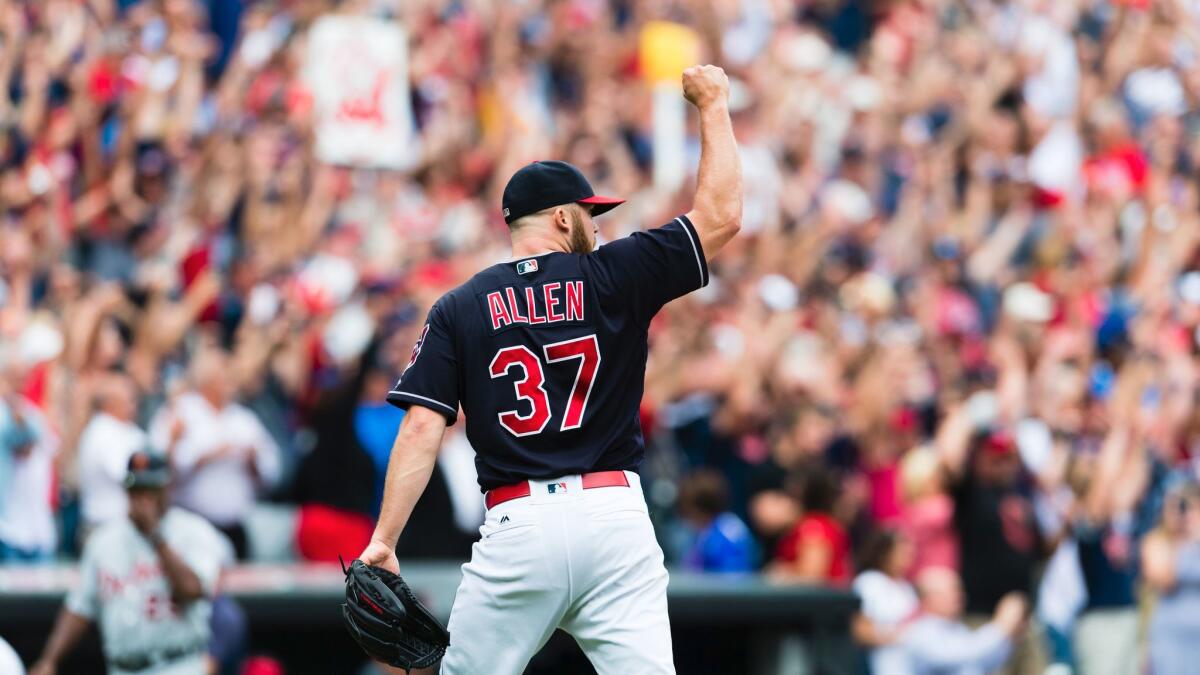 Cleveland pitcher Cody Allen celebrates after the Indians defeated Detroit on Wednesday for their American League-record 21st straight win.