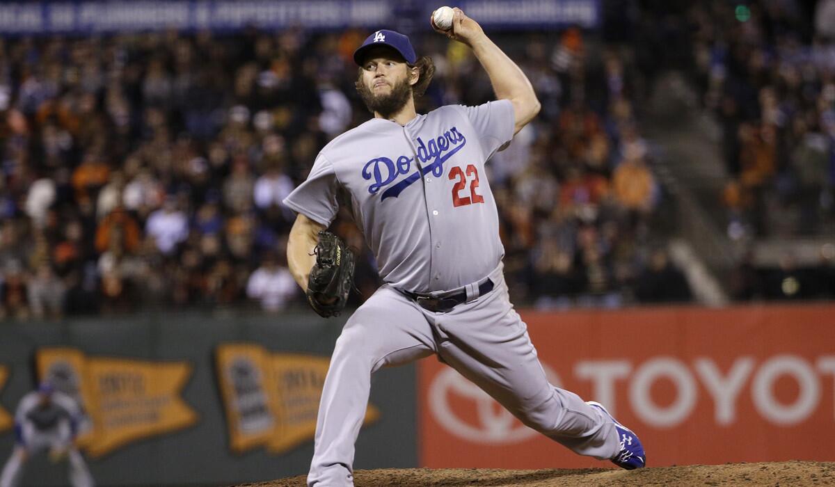 Dodgers pitcher Clayton Kershaw during the eighth inning in his win over the San Francisco Giants on Tuesday. He allowed one hit, one walk and struck out 13 as the Dodgers clinched their third consecutive division title.