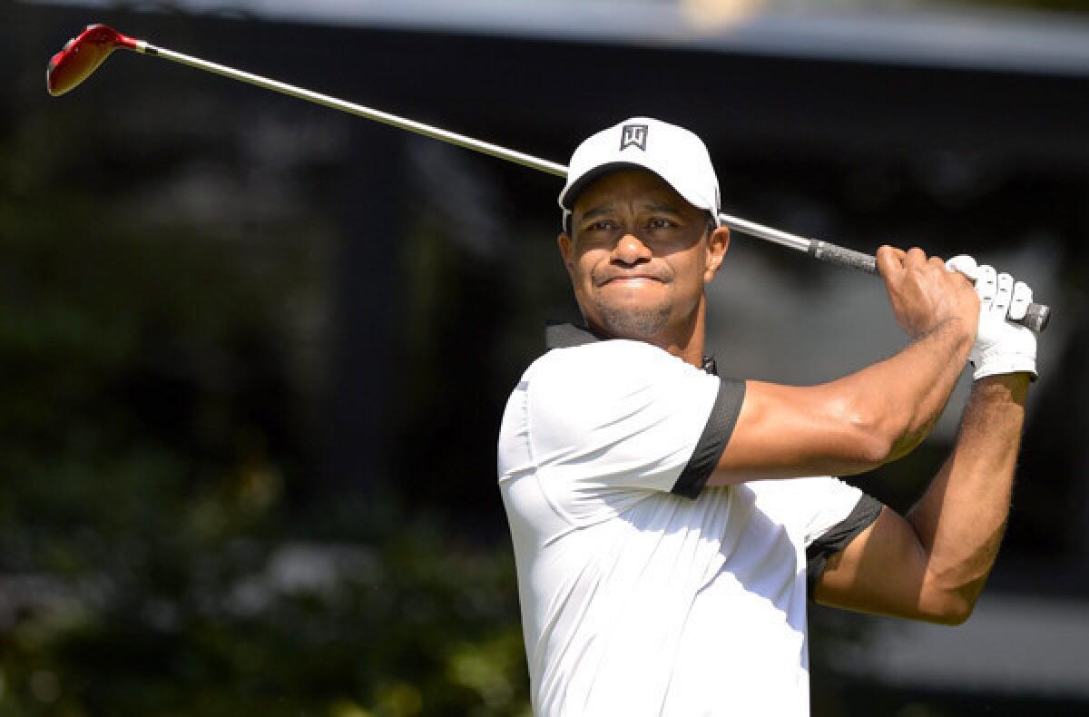 Tiger Woods watches his tee shot at No. 4 during the second round of the Tour Championship at East Lake Golf Club in Atlanta.