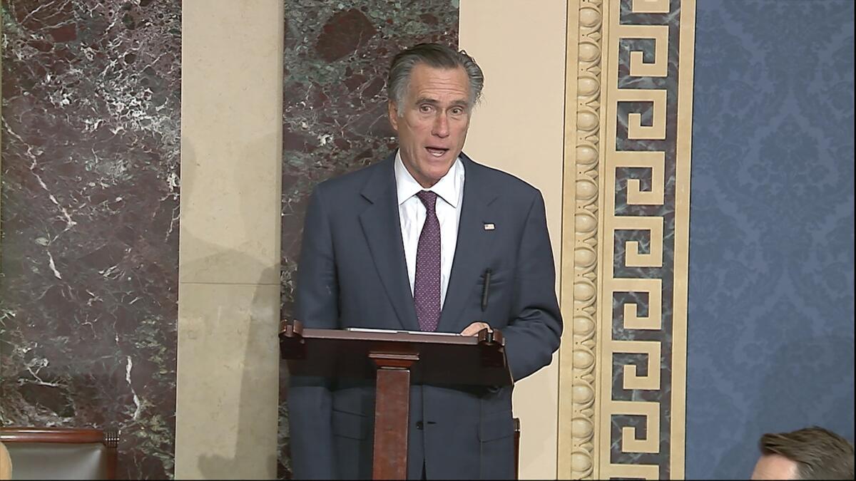 Sen. Mitt Romney, R-Utah, speaks as the Senate reconvenes to debate the objection to confirm the Electoral College Vote