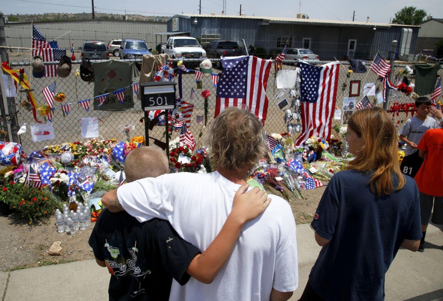 The firefighters were killed Sunday when flames tearing through the town of Yarnell, Ariz., overtook them.