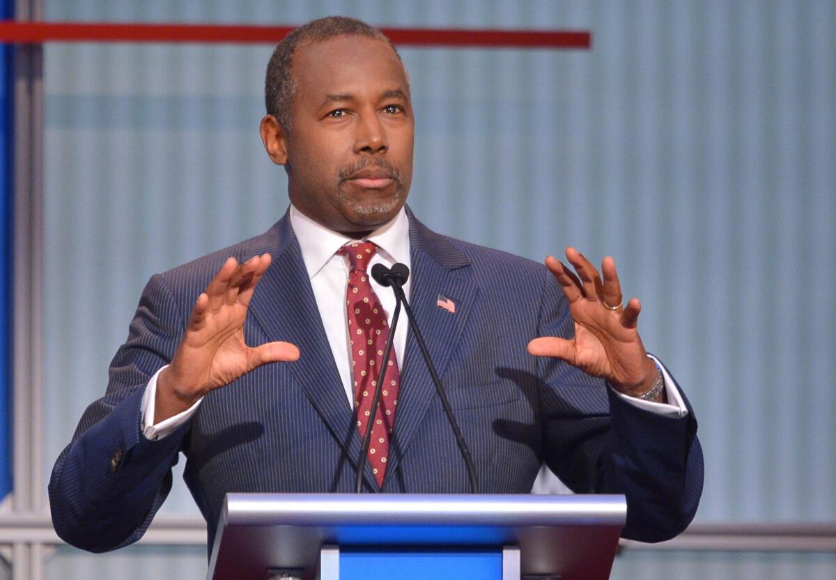 (FILES) In this August 6, 2015 file photo, Republican presidential hopeful Ben Carson speaks during the prime time Republican presidential primary debate at the Quicken Loans Arena in Cleveland, Ohio. Retired neurosurgeon Ben Carson has drawn even with front-running billionaire Donald Trump in a poll in early-voting Iowa released August 31, 2015, as political outsiders surge in the US presidential race. Real estate magnate Trump has spent weeks dominating the Republican field, and has emerged as a credible White House candidate for many voters in Iowa, the first crucible of the 2016 nominating contest. AFP PHOTO/MANDEL NGAN/FILESMANDEL NGAN/AFP/Getty Images ** OUTS - ELSENT, FPG - OUTS * NM, PH, VA if sourced by CT, LA or MoD **