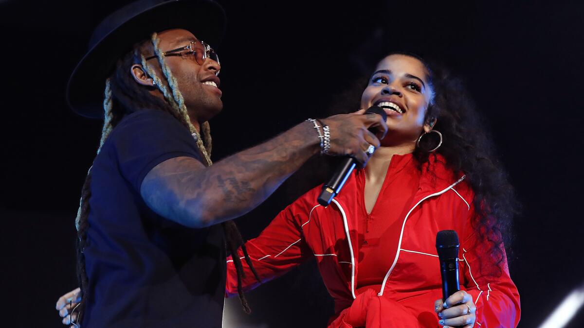Ty Dolla $ign, left, performs with Ella Mai.