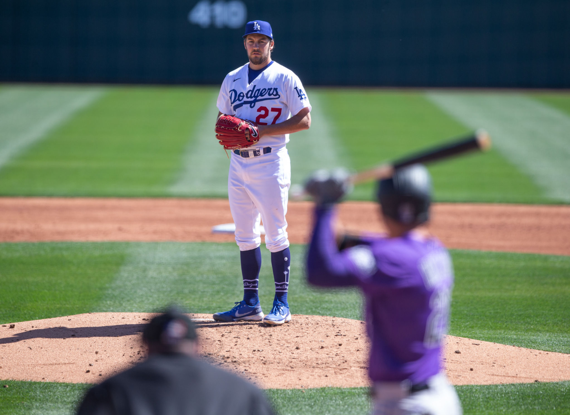 Trevor Bauer pitches for the Dodgers in a spring training game against the Colorado Rockies in March 2021.