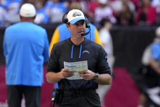 Los Angeles Chargers head coach Brandon Staley watches during the first half of an NFL football game against the Arizona Cardinals, Sunday, Nov. 27, 2022, in Glendale, Ariz. (AP Photo/Rick Scuteri)