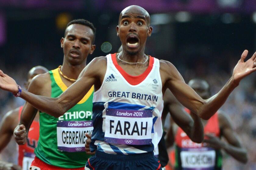 Britain's Mo Farah celebrates after winning gold in the men's 5,000 meters at the 2012 Olympic Games in London.