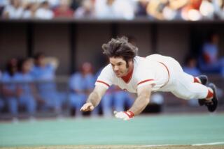 Baseball: Cincinnati Reds Pete Rose (14) in action, sliding sliding head first into homeplate.