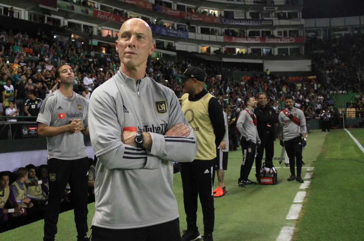 LAFC coach Bob Bradley watches his team from the sideline.