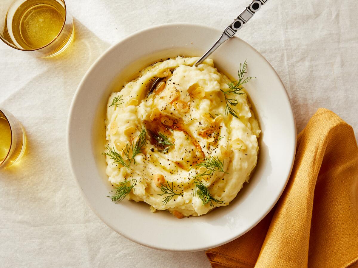 Sizzled Garlic and Labneh Creamed Potatoes by Chef Andy Baraghani. Prop styling by Dorothy Hoover.