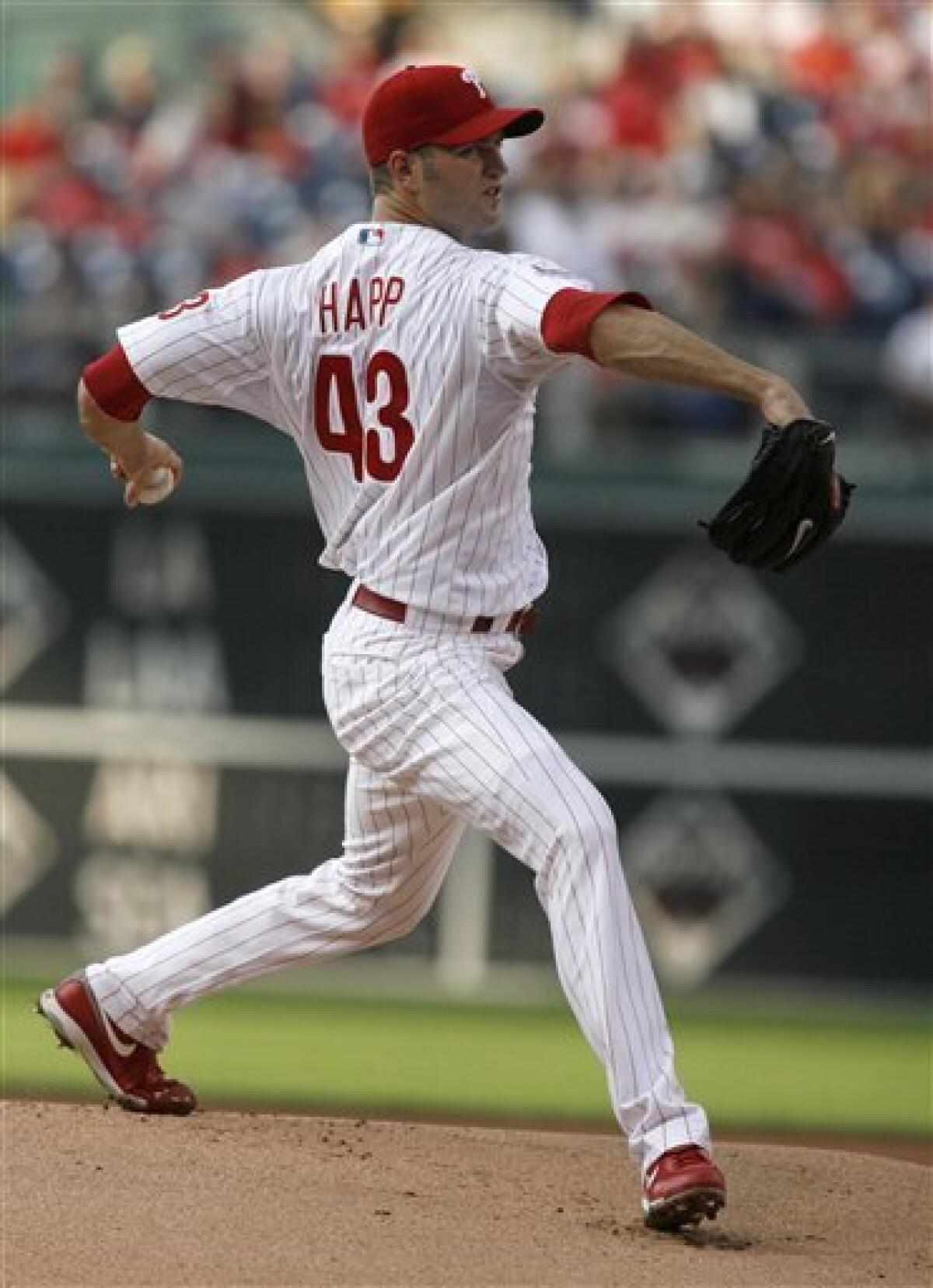 Philadelphia Phillies' Greg Dobbs (19) celebrates his-two run home