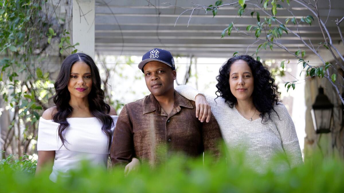 Sanaa Lathan, left, stars in Fox's "Shots Fired," a gritty drama about law enforcement shootings of young men, from creators Reggie Rock Bythewood and his wife, Gina Prince-Bythewood.