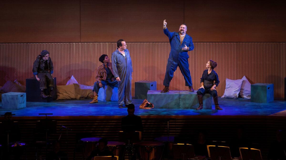 Raymond McAnally as Bottom, second from right, performs in "A Midsummer Night's Dream" as principal guest conductor Susanna Malkki leads the Los Angeles Philharmonic Thursday night at the Walt Disney Concert Hall.