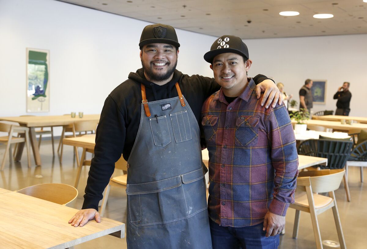 Chefs Philip Tangonan and Ross Pangilinan, from left, at their new restaurant Verdant in Costa Mesa.