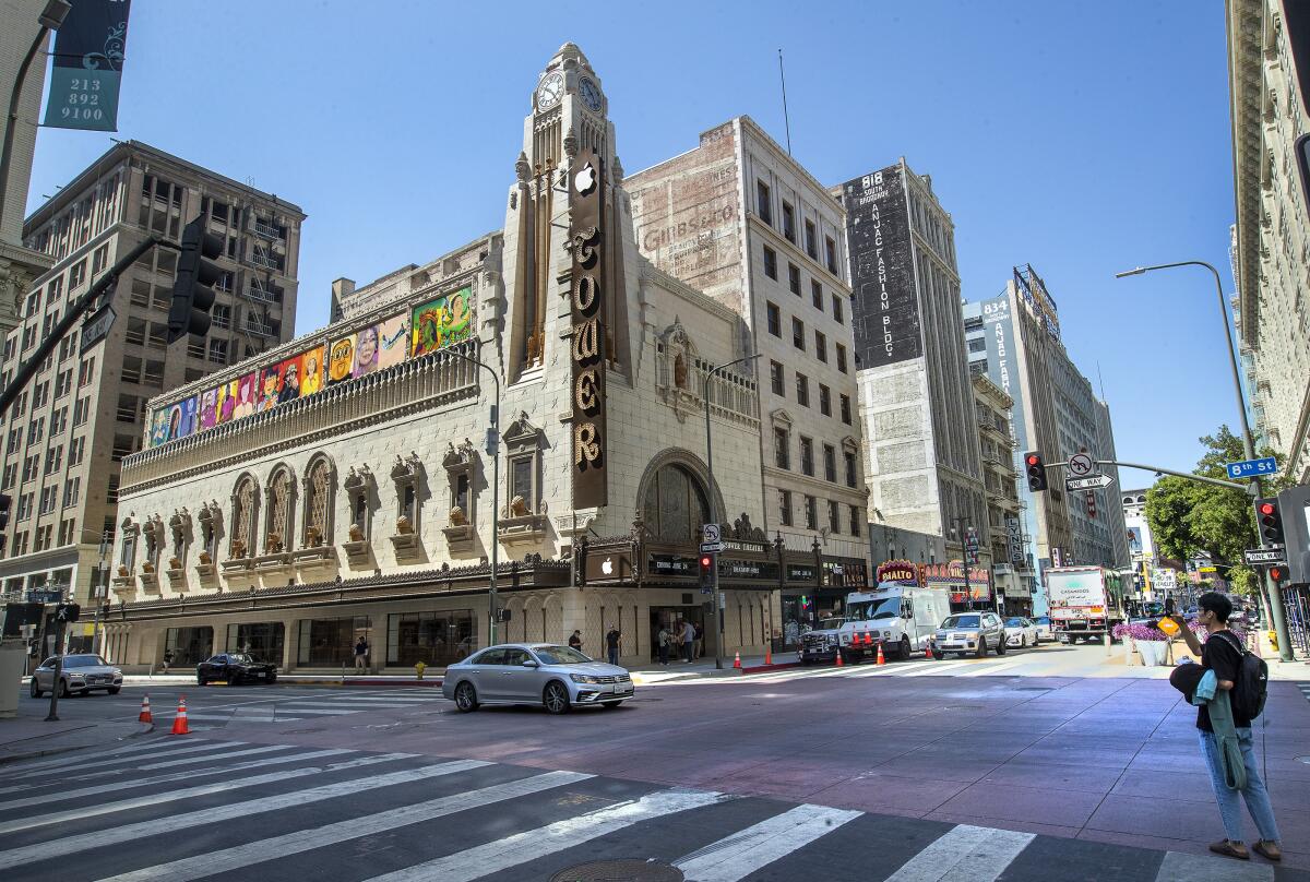 An ornate city building on a corner.