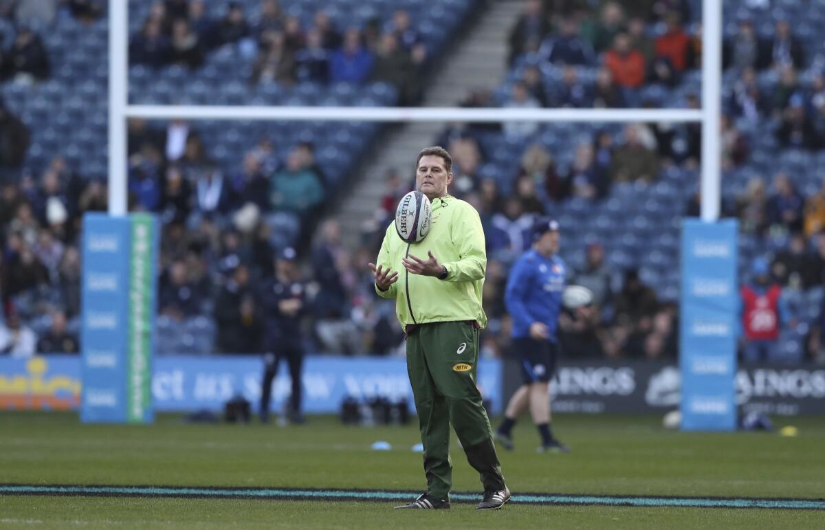 Rassie Erasmus, Director of Rugby watches on players warming up for the rugby union international match between Scotland and South Africa at the Murrayfield stadium in Edinburgh, Scotland, Saturday, Nov. 13, 2021. (AP Photo/Scott Heppell)