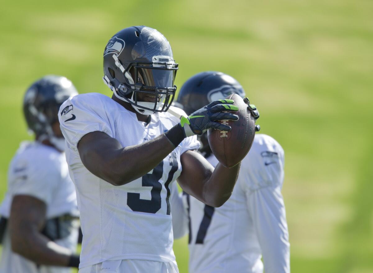 Safety Kam Chancellor practiced with the Seahawks on Wednesday for the first time after holding out over a contract dispute.