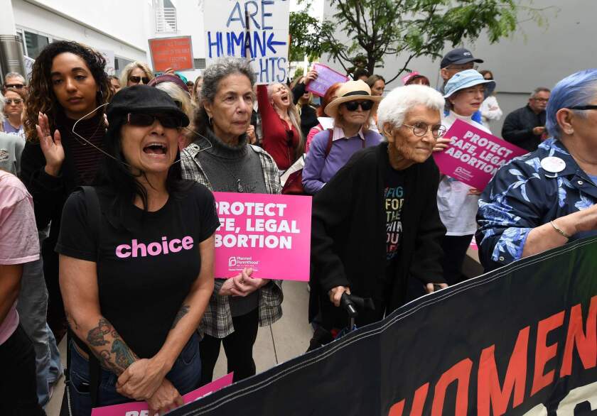 Abortion rights advocates rally in West Hollywood in May to protest new restrictions on abortions in some states.