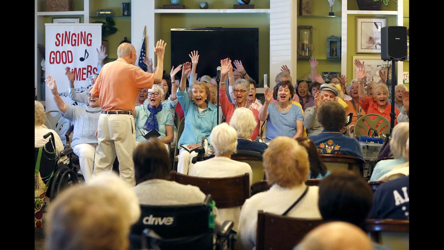 The Singing Goodtimers, who sing for seniors in assisted living facilities, perform their opening act at Huntington Terrace in Huntington Beach on May 25.