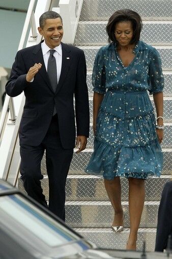 Michelle Obama in a polka-dotted Diane von Furstenberg dress at the Pittsburgh International Airport in September 2009, before her husband attends the G20 Summit in town.