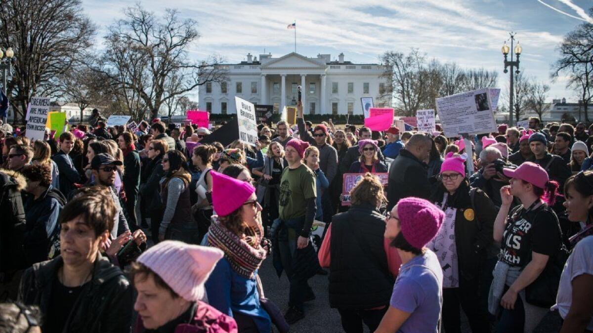 Attendees gather in front of the White House during the Women's March in Washington on Jan. 20, 2018.