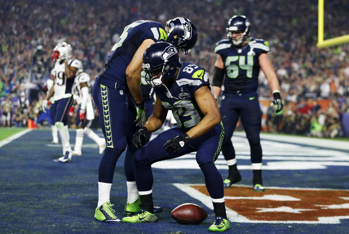 Seattle receiver Doug Baldwin celebrates after catching a touchdown pass against the New England Patriots during Super Bowl XLIX.