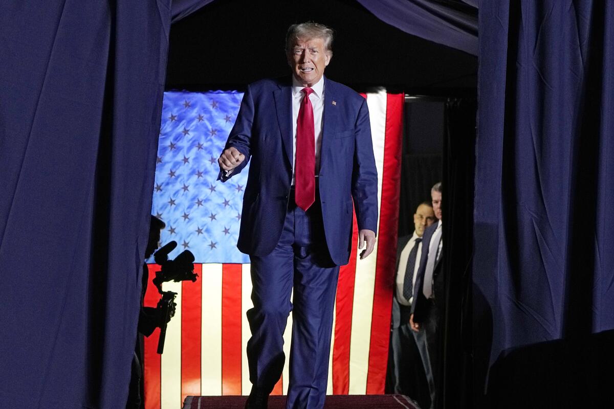 Former President Donald Trump arrives at a campaign rally