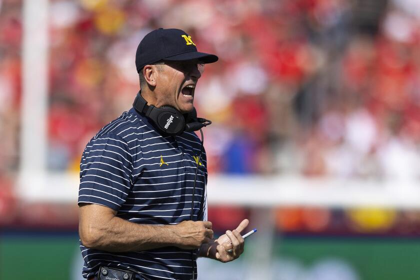 Michigan head coach Jim Harbaugh celebrates after a touchdown against Nebraska during the first half of an NCAA college football game Saturday, Sept. 30, 2023, in Lincoln, Neb. (AP Photo/Rebecca S. Gratz)