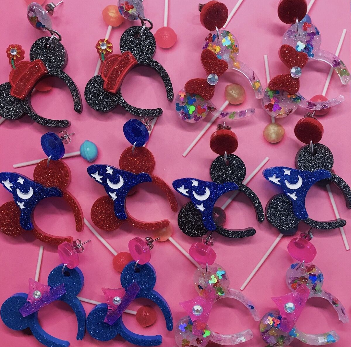 Mickey and Minnie Mouse earrings.
