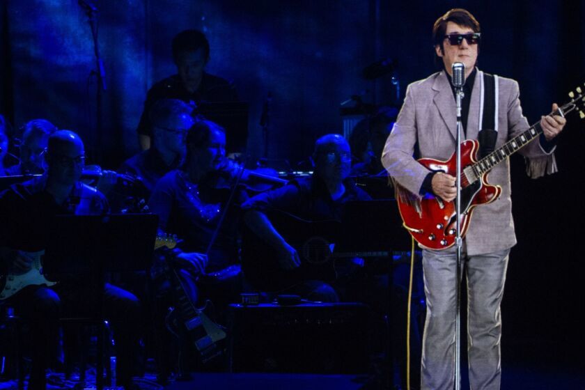 LOS ANGELES, CALIF. - OCTOBER 02: A hologram of Roy Orbison performs with the Los Angeles Orchestra at The Wiltern on Tuesday, Oct. 2, 2018 in Los Angeles, Calif. (Kent Nishimura / Los Angeles Times)