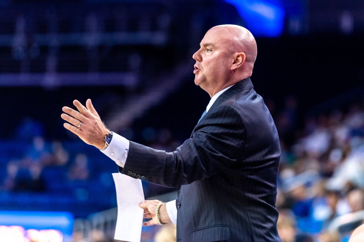 UCLA assistant basketball coach Michael Lewis will become the head coach at Ball State.